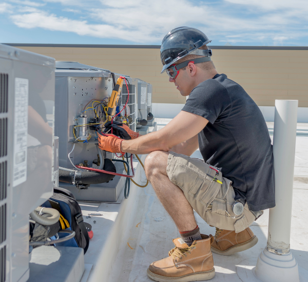 HVAC tech installing a new system